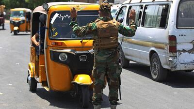 An Iraqi soldier at the Shiite slum of Sadr City in Baghdad on June 3, 2020 amid restrictions imposed to curb the coronavirus spread. AFP