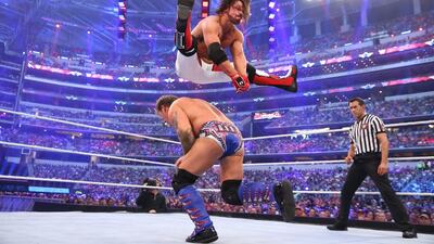 AJ Styles, top, will lose to Roman Reigns on Sunday at WWE Payback. Photo Courtesy: WWE