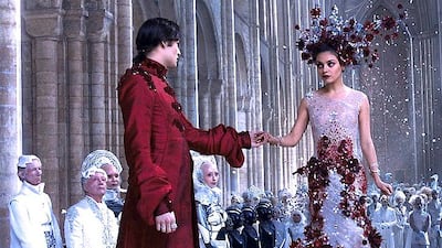 Mila Kunis in 'Jupiter Ascending' in 2015 in a design by Michael Cinco