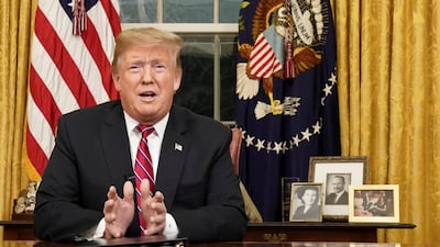 US President Donald Trump delivers a televised address to the nation from his desk in the Oval Office about immigration and the southern US border, January 8, 2019. Reuters