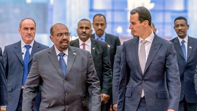 Syrian President Bashar Al Assad, right, meets Sudan's Omar Al Bashir in Damascus. EPA/SANA