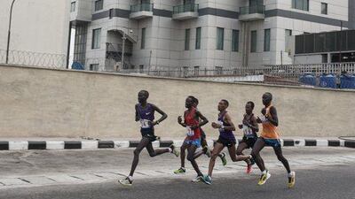 Athletes compete in the Lagos City Marathon on Saturday in Nigeria. AFP Photo