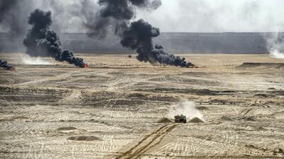 Egyptian tanks take part in a military exercise northwest of the capital Cairo on November 15, 2018. AFP.