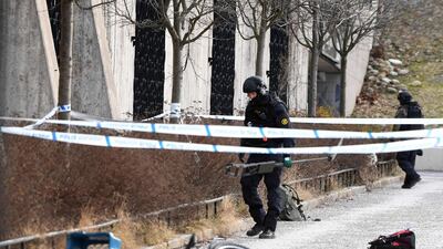 Police investigate the scene of the blast in Stockholm / AFP PHOTO / TT News Agency / Henrik MONTGOMERY / Sweden OUT