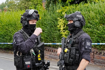 Armed police officers at Heaton Park Synagogue in Manchester, after it came under attack in October 2025. PA