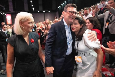 Andy Burnham and his wife Marie-France after his speech. AFP