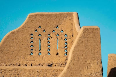 The centuries-old sections retain a rough hue from years of weathering and the fermented camel dung in the brick mix. Thamer Al Ahmadi / DGDA