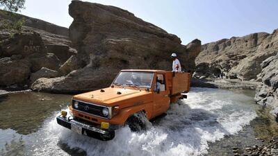 One of the meteorological near-certainties of an Arabian summer is an absence of rain but sometimes weather patterns can surpise you. Charles Crowell / The National