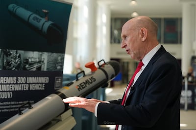 Defence Secretary John Healey looks at Remus mine hunting equipment during the joint multinational Strait of Hormuz planning conference. Alastair Grant - WPA Pool / Getty Images