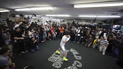 Manny Pacquiao shadow-boxes in the middle of the ring for media on Wednesday during a training session for his upcoming fight with Floyd Mayweather. Jae C Hong / AP