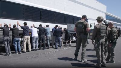 US immigration agents at a Hyundai-LG electric vehicle battery plant in Ellabell, Georgia, on September 4. South Koreans suspected of working in the US illegally were the majority of the 475 people arrested in the raid. AFP