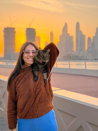 Danai Koukoulommati with one of her cats in Dubai. Photo: Danai Koukoulommati