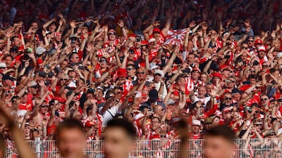 Union Berlin players and fans celebrate after qualifying for the Champions League. EPA