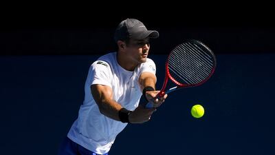 Marcos Giron of the United States returns to Rafael Nadal of Spain. EPA