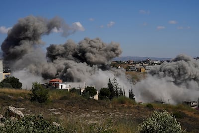 Smoke covers part of southern Lebanon after an Israeli strike. Reuters