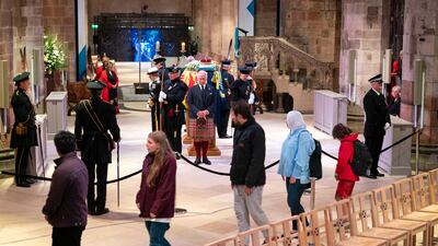 King Charles III, Prince Edward, Princess Anne and Prince Andrew hold a vigil at St Giles' Cathedral as members of the public walk past. Getty Images