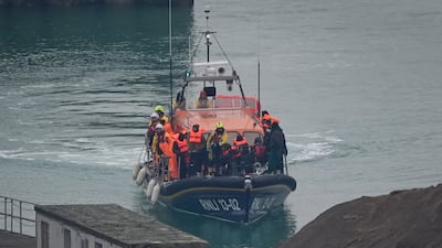 Migrants are brought in to Dover, in Kent, south-east England, on Saturday. PA Wire