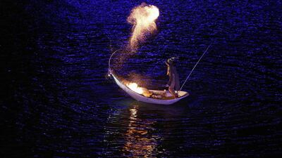 A member of France's Ilotopie theatre company performs on the water during their "Fous de Bassin" show, at the opening of Buenos Aires' 9th International Theatre Festival, in Puerto Madero neigbourhood October 4, 2013. Reuters/Marcos Brindicci