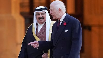 King Charles and King Hamad walk after inspecting the Guard of Honour. Reuters