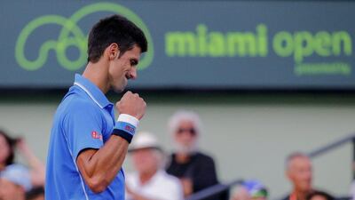 Novak Djokovic of Serbia reacts against Alexandr Dolgopolov of Ukraine during a fourth round match at the Miami Open tennis tournament on Key Biscayne, Miami, Florida, USA, 31 March 2015. EPA/ERIK S. LESSER