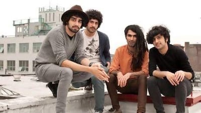 The Yellow Dog band members in their Brooklyn neighbourhood. From left, Arash, his brother Looloosh, Obaash and Koory. Dave Sanders for The National