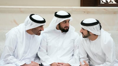 From left: Sheikh Saeed bin Zayed, Sheikh Ahmed bin Mohammed bin Rashid and Sheikh Hamdan bin Mohammed attend an iftar reception at Al Bateen Palace.