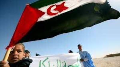 Saharawi children show support for their native Western Sahara in one of the refugee camps in south-west Algeria. Since October, Morocco has jailed Saharawi activists it says work for the Polisario Front.