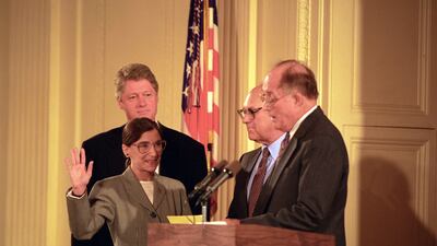Mr Clinton watches as Ginsburg is sworn in to the Supreme Court. Photo: US National Archives