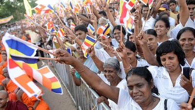 Sri Lankans participate in a rally calling for a ban on Islamic halal-slaughtered meat at Maharagama, a suburb of the capital Colombo (AFP PHOTO/Ishara S.KODIKARA)