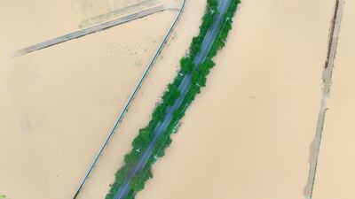 Farmland is inundated in Hampyeong, South Jeolla Province in south-western South Korea, following heavy rain that brought 170mm of rain the previous day. EPA