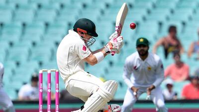David Warner, the Australian opener, ducks under a bouncer from Pakistan paceman Mohammed Amir during the first day of the third Test at the SCG in Sydney. William West / AFP Photo