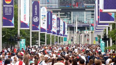 Fans arrive at Wembley Way before the Women's Euro 2022 final between England and Germany at the Wembley Stadium, London, on Sunday, July 31, 2022. PA