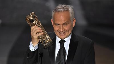 Carlos Conti receives the Best Set Design Award for the film 'Adieu les cons' (Bye Bye Morons) during the 46th Cesar Awards ceremony at the Olympia concert hall in Paris, France. Reuters