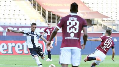 Parma's Juraj Kucka (L) scores the equalising goal against Torino. EPA