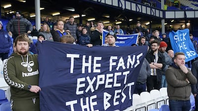 Fans protest against the Everton board at Goodison Park. AP