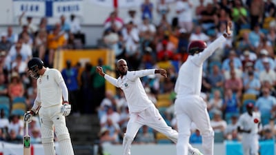 West Indies' Roston Chase celebrates taking one of is eight wickets. Action Images via Reuters/Paul Childs