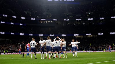 Tottenham players celebrate a win that boosts their hopes of finishing in the top four in the Premier League. AP
