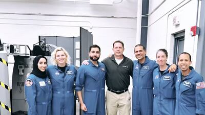 Ms Al Matrooshi (left) and Mr Al Mulla (second to left) at a simulation flying ground school with their Nasa colleagues. Photo: Anil Menon Instagram