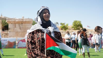 Players stand for the National Anthem before the match. Amy McConaghy / The National