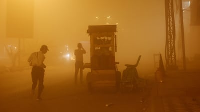 A dust storm lowers visibility in Najaf, Iraq. Reuters