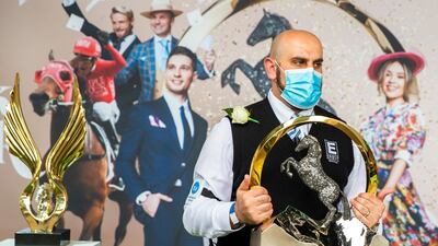 A security guard carries the Everest trophy during Everest Race Day at Royal Randwick Racecourse in Sydney, Australia. Getty Images