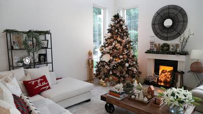 The living room houses the Christmas tree