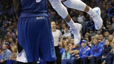 Russell Westbrook leads the NBA in scoring this year with 27.4 points per game. Sue Ogrocki / AP / March 13, 2015