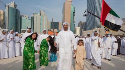 ABU DHABI, UNITED ARAB EMIRATES - February 28, 2013: HH General Sheikh Mohamed bin Zayed Al Nahyan Crown Prince of Abu Dhabi Deputy Supreme Commander of the UAE Armed Forces (C), dances inside the grounds of Qasr Al Hosn during the opening of the Qasr Al Hosn Festival, celebrating the 250th anniversary of the fort. .( Christopher Pike / Crown Prince Court - Abu Dhabi )