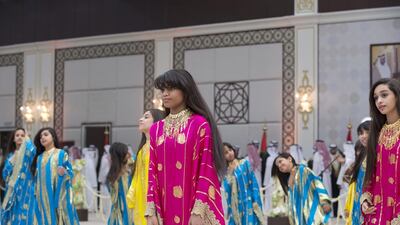 Girls perform a traditional dance. Ryan Carter / Crown Prince Court - Abu Dhabi