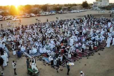 Sudanese men prepare to break their fast at an iftar during Ramadan in Dongola, in Sudan's Northern State. AFP