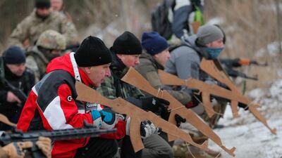 Ukrainian reservists attend a military exercise at a training ground near Kiev, Ukraine. According to a survey conducted by the Kiev International Institute of Sociology (KIIS) in December 2021 and published on 17 December 2021, the 50,2 percent of Ukrainians said they would resist in case of a Russian military intervention into their city, town or village. Every third respondent to the poll, the 33,3 percent, said they were ready to engage in armed resistance while the 21. 7 percent said they were ready to participate in civil resistance actions. Tensions with Russia have pushed many Ukrainians to sign up to territorial defense units. EPA