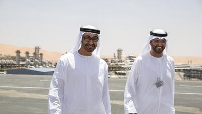 Sheikh Mohammed bin Zayed, left, Crown Prince of Abu Dhabi and Deputy Supreme Commander of the UAE Armed Forces, with Sultan Al Jaber, chief executive of Adnoc, during the inauguration of the Al Hosn gas facility. Ryan Carter / Crown Prince Court - Abu Dhabi