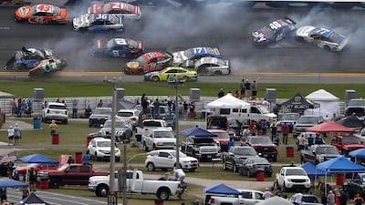 The first major crash of the race after just 14 laps. AFP