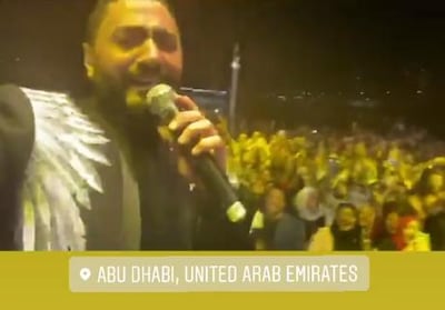 Tamer Hosny on stage during his New Year's Eve performance in Abu Dhabi. Instagram / Tamer Hosny
